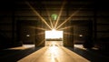 Sunlight streams into a warehouse through open loading dock doors creating bright rays Royalty Free Stock Photo