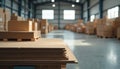 Warehouse interior with stacks of cardboard sheets and boxes. Pallets hold material ready for shipping. Backdrop shows inventory Royalty Free Stock Photo