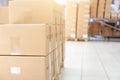 Warehouse with its own production. A pile of cardboard boxes on a pallet. The concept of shipping and delivery of goods from a Royalty Free Stock Photo