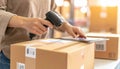 Warehouse logistics concept with worker scanning barcode on package using digital tablet illustrating efficiency, technology, and Royalty Free Stock Photo