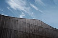A warehouse made with iron sheeting under the blue sky