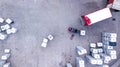 Warehouse man worker with forklift. Loading truck. Aerial Royalty Free Stock Photo