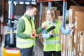 Warehouse Management System. Worker with barcode scanner Royalty Free Stock Photo