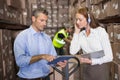 Warehouse manager and foreman working together Royalty Free Stock Photo