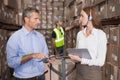 Warehouse manager and foreman working together Royalty Free Stock Photo