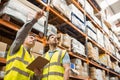 Warehouse manager and foreman working together Royalty Free Stock Photo