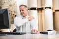 Warehouse manager suffering from shoulder pain