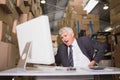 Warehouse manager using computer Royalty Free Stock Photo