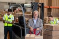 Warehouse manager and workers preparing a shipment Royalty Free Stock Photo