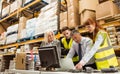 Warehouse managers and worker talking Royalty Free Stock Photo