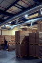 Warehouse with modern ventilation system full of raw material