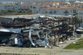 Warehouse with motorboats and yachts destroyed by hurricane winds in Florida coastal area. Natural disaster and its