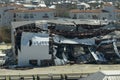 Warehouse with motorboats and yachts destroyed by hurricane winds in Florida coastal area. Natural disaster and its