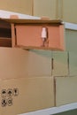 Warehouse with opened boxes with sanitizer. Theft of soap in a mail warehouse during quarantine due to coronavirus