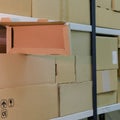Warehouse with opened boxes. Thief at the mail warehouse