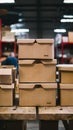 Warehouse organization boxes neatly stacked on wooden table surface