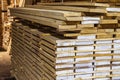 Warehouse packed with variety of timber for construction and rep