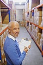 Warehouse, portrait or senior man with clipboard for logistics, planning or inventory. Face, factory and male manager Royalty Free Stock Photo