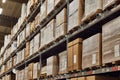 Warehouse with stocked shelves of boxes Royalty Free Stock Photo