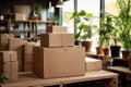 Warehouse For Small Businesses Go green. Carton boxes on wooden table with green plants on background.