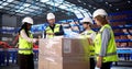 Warehouse Staff Receiving Instructions On Efficient Pallet Wrapping Techniques Royalty Free Stock Photo