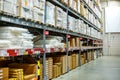 Warehouse, storage room in a large store. Laid out the goods on the shelves Royalty Free Stock Photo