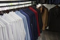 A warehouse,store photo of lot shirts, multicolour,shop fashion mem formal business office clothes.
