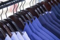 A warehouse,store photo of lot shirts , multicolour,shop fashion men clothes.