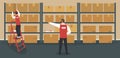 Warehouse or storeroom: storekeeper on ladder near rack with cardboard boxes and his boss gives him instructions.Cargo in packages Royalty Free Stock Photo