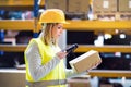 Warehouse woman worker with barcode scanner. Royalty Free Stock Photo