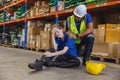 Warehouse women worker feel down, accident injury and hurt girl crying friend supervisor help support