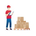 Warehouse worker checking goods on pallet stock