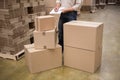 Warehouse worker checking his list on clipboard Royalty Free Stock Photo