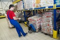 Warehouse worker with forklift Royalty Free Stock Photo