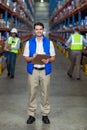 Warehouse worker holding clipboard Royalty Free Stock Photo