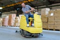 warehouse worker loading construction materials with forklift Royalty Free Stock Photo