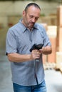 warehouse worker programming handheld scanner Royalty Free Stock Photo