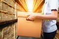 Warehouse worker taking package Royalty Free Stock Photo