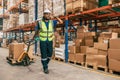 warehouse worker using parcel pallet in cargo shipping logistics ship supply management employee workplace concept Royalty Free Stock Photo