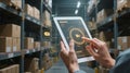 Warehouse Worker Using Tablet for Inventory Management Royalty Free Stock Photo