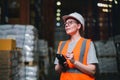 Warehouse worker working process checking the package using barcode reader in a large distribution center Royalty Free Stock Photo