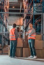 warehouse workers with boxes Royalty Free Stock Photo