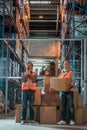 warehouse workers with boxes Royalty Free Stock Photo