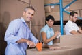 Warehouse workers preparing a shipment