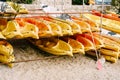 A warehouse of yellow kayaks on the shore. Single kayaks. Rental kayakshop store on sandy beach Royalty Free Stock Photo