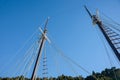 Old fashioned sailing boats moored alongside waterfront pier on Mahurangi River Royalty Free Stock Photo