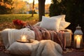 warm blankets and pillows assembled for cozy outdoor seating