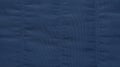 Warm blue dark jacket fabric texture background close-up. Royalty Free Stock Photo