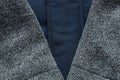 warm blue dark jacket sleeve wool fabric texture background close-up. Royalty Free Stock Photo