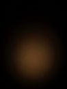 Warm Brown Gradient Background with a Soft Spotlight Effect in the Center and Dark Edges for Subtle Presentation Keywords: Royalty Free Stock Photo